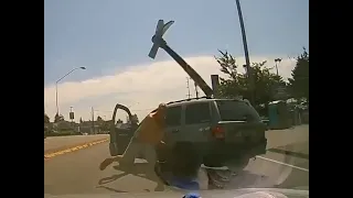 Extreme Road Rage As Man Throws AXE At Driver!