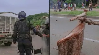 Debris blocks roads following anti-government protest in Solomon Islands | AFP