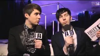 dan and phil at the brit awards backstage