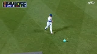 An escaped balloon gets onto the field