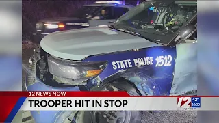 Mass State Trooper, cruiser struck by vehicle