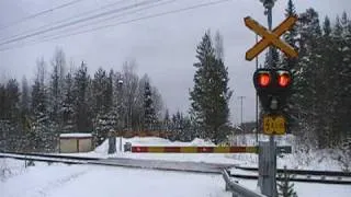 Finnish freight train 2747 passed Punasvaara level crossing