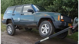 Putting a 2" Trail Master lift kit on a Jeep Cherokee