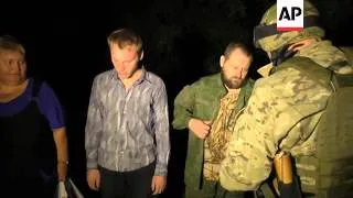 Government and rebel forces in Ukraine exchanged dozens of prisoners on Friday, as part of a ceasefi