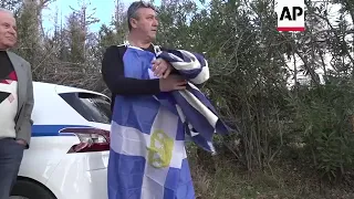 Reaction as former king of Greece is buried