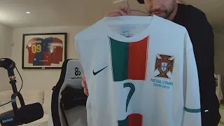 Gerard Pique shows off his Cristiano Ronaldo shirt