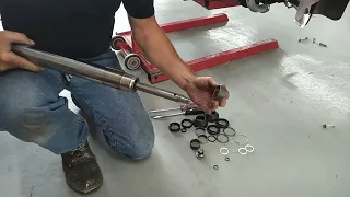 How to rebuild the front forks on a Harley Davidson Heritage.