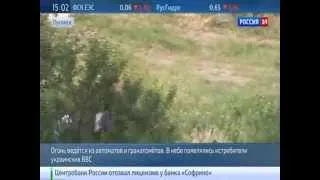 Ужасные кадры с Луганска,на парковке лежит тело,обстрел парковки