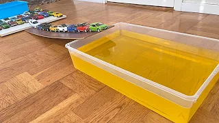 Diecast Cars Pullback And Let Go On The Slope Into The Water