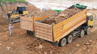 Look pretty Cool Massive Dump Truck Unloading Rock Dirt Technique Skills Driver