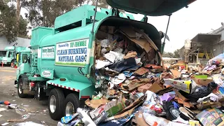 Garbage Trucks Unloading Recycling