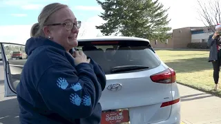 Kindergarten teacher sobs when Secret Santa surprises her with a car at school