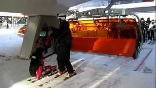 Adaptive skiing - getting on a chairlift with bi-ski ( Piloted Dualski)