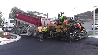 Paving Asphalt Road With CAT Paver Machine Asphalt Paving Crew In Action