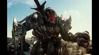 megatron looks at starscreams head/Transformers the last Knight