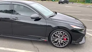 Phantom Black Elantra N with blacked out trim, mudflaps