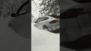 Tesla model X in deep snow￼