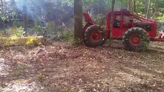 240 timberjack pulling big poplar