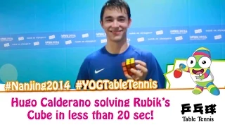 Hugo Calderano solves a rubik's cube in less than 20 seconds!