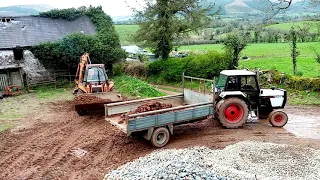 Case 580G Loading Trailer On Case 1494