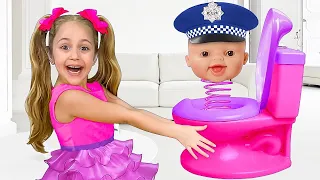 Anita and Yarik pretend play police and dress up in different costumes