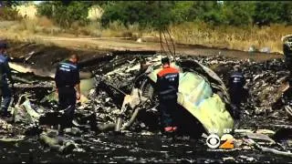 Forensics Experts Begin To ID Remains Of MH-17 Passengers