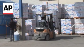 Dozens of trucks bring aid into Gaza through Rafah crossing