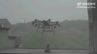 Drone drops off robot dog with a machine gun mounted on top (China)