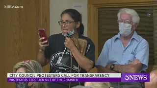 Two women get escorted out of City Council meeting after outburst about budget meetings being held v