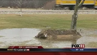 Family of eroded gravesite concerned for visitors to cemetery