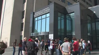 Dozens of protestors gather outside Franklin County Municipal Court after Ohio State students arrest