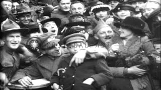 Paris wildly celebrates Armistice Day ending World War I. Merrymaking by all. HD Stock Footage