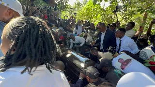 CHAOS! AT BRIAN CHIRAS BURlAL  AS HIS BODY WAS LAID TO REST