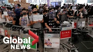Hong Kong protests: Flights cancelled as demonstrators take over airport for fifth day