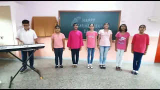 A HAPPY BAND ( school anthem)  sung by Annmary Johnson and her group friends