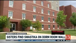 Sisters find swastika on dorm room wall