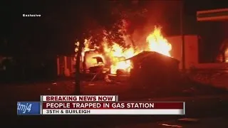 Exclusive: Looters Set Fire to BP Gas Station