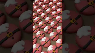 Making hundreds of Santa macarons