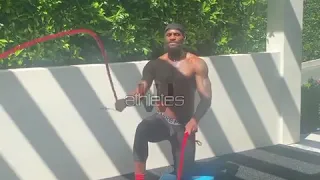 Lebron James Lakers Star works shoulders and abs with bands and weights during quarantine 2020