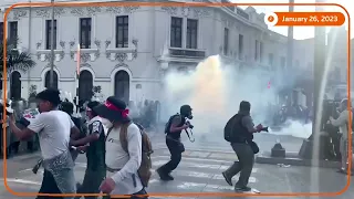 Riot police face off with protesters in Peru