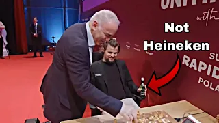 Garry Kasparov plays Magnus Carlsen's first move in Chess Tournament