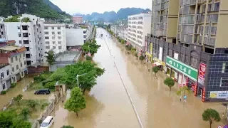 Foot bridge collapses moments after woman crosses it