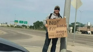 Man ticketed after giving change to cop posed as panhandler
