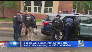 11 People Arrested, Charged After Standoff In Wakefield On I-95