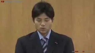 Japanese politician Ryutaro Nonomura sobs at news briefing
