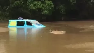 English backpackers' campervan submerged in Queensland crocodile danger zone