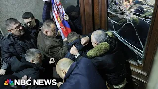 Serbia election protesters try to storm capital’s city hall