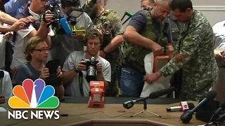 Ukrainian Rebels Hand Over MH17 Black Boxes | NBC News