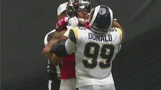 Aaron Donald Lifts up & Fights Devonta Freeman!