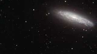 Panning Across Galaxies NGC 4668 & NGC 4666 [720p]